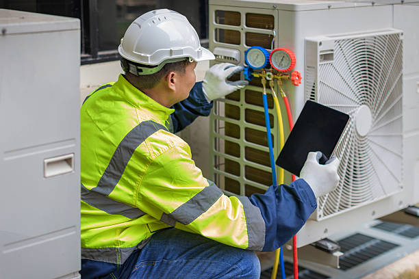 Professional Hvac technician working in Hollis, NY